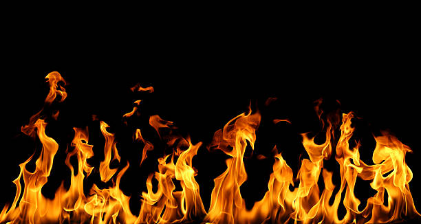 istock Realistic isolated fire flames on black background, perfect for digital design, photo compositing, visual effects, and creative projects requiring high-detail fiery textures and dynamic heat energy. 2248537699
