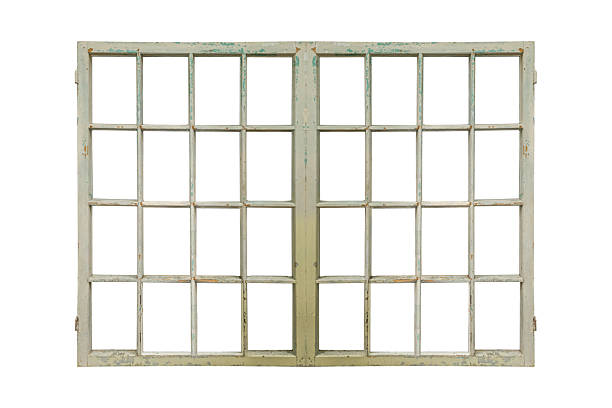 istock Old multi-pane wooden window frame with peeling light paint is isolated. 2248538867
