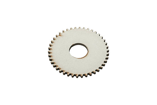istock Light wooden gear wheel in perspective is isolated. 2248538908