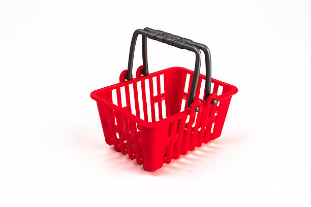 istock Red shopping cart against light gray background, angled for open side view, empty, vibrant color, soft lighting, minimalist design. m 2248539998