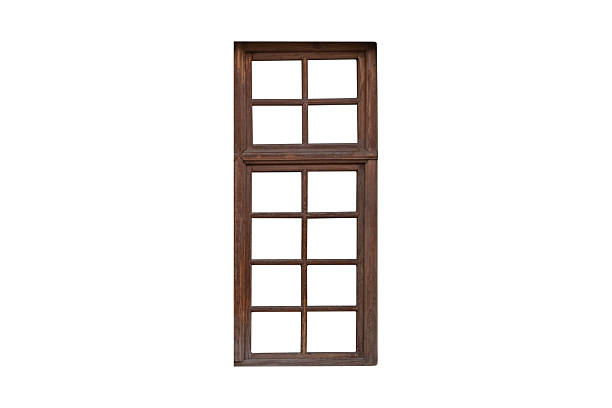 istock Old brown wooden window frame with divided panes, is isolated. 2248540945