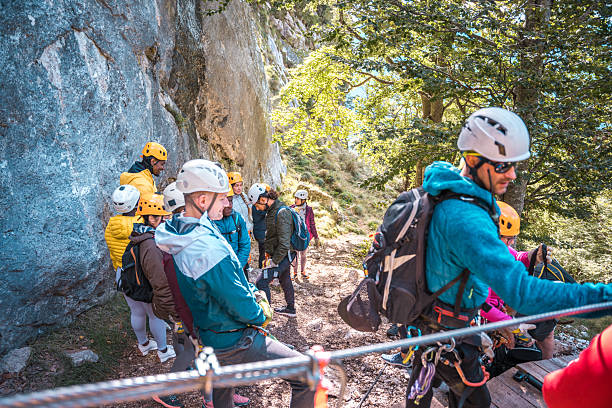 istock Diverse Group Preparing for Zipline Adventure in Nature 2248542369