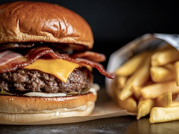 istock Cheeseburger with Bacon and Fries 2248542935