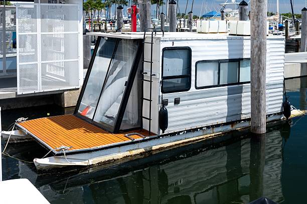 Small house boat in the marina