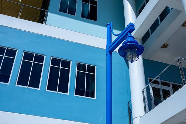 exterior of modern building and blue lamp post