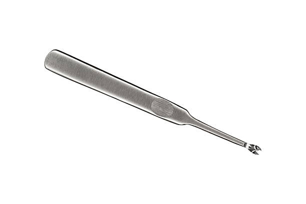 istock Stainless steel watch spring bar removal tool with textured flat handle is isolated. 2248545397