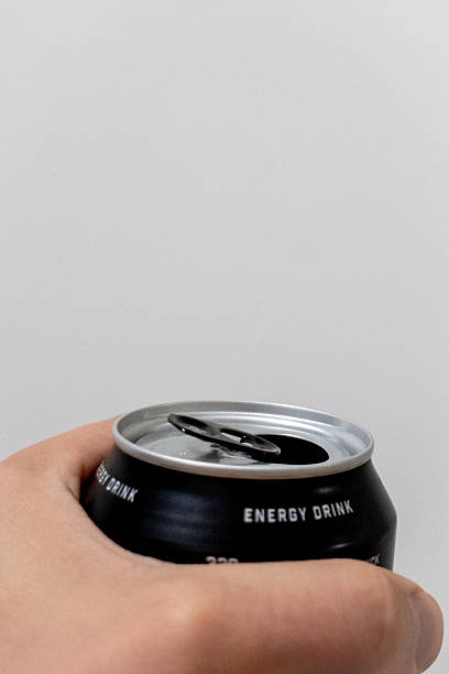 istock Hand Opening Energy Drink Can Refreshing Fizz 2248548099