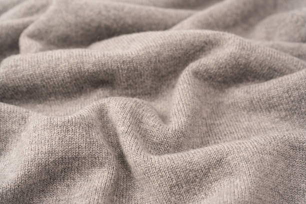 istock Soft grey merino wool sweater texture as a background. 2248550223