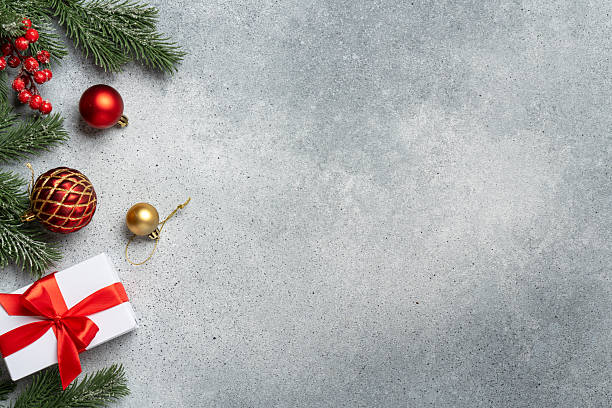 istock Christmas present, balls and fir tree branches. 2248550475