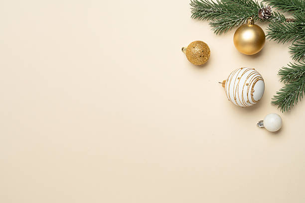 istock Christmas holidays decorations, gift box, balls and fir tree branches. 2248550688