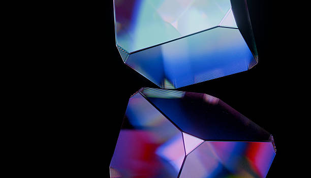 istock Colorful geometric prisms reflecting light on black background, creating vibrant and abstract visual effect 2248554280