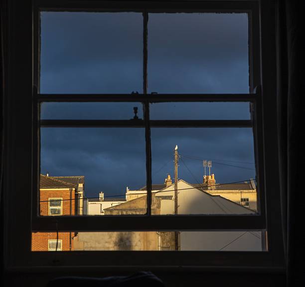 istock View at a sunset through a hotel window at Swindon Wiltshire England 2248555267