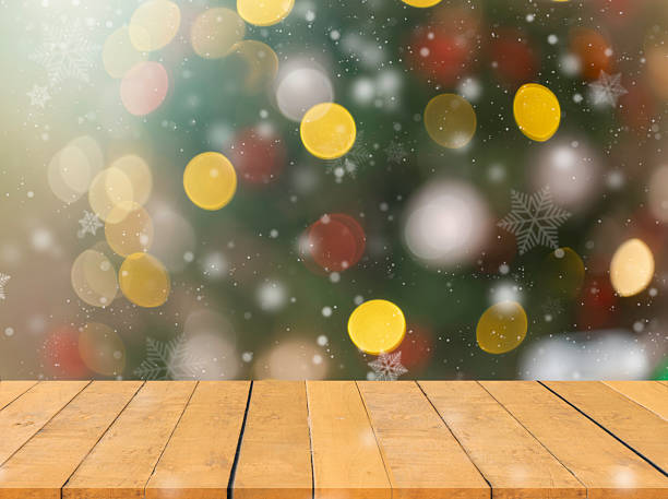 istock Empty table in front of christmas tree with decorations background. For product display montage Christmas holiday background 2248556940
