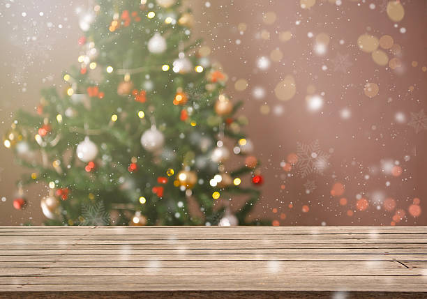 istock Empty table in front of christmas tree with decorations background. For product display montage Christmas holiday background 2248556943