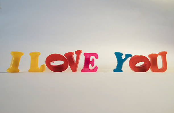 istock Colorful plastic letters spelling I LOVE YOU arranged on a clean, bright background 2248557427