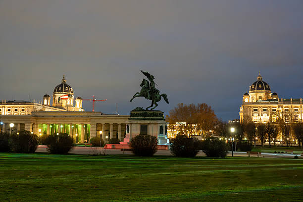 istock Historic buildings and equestrian statue at night 2248558467