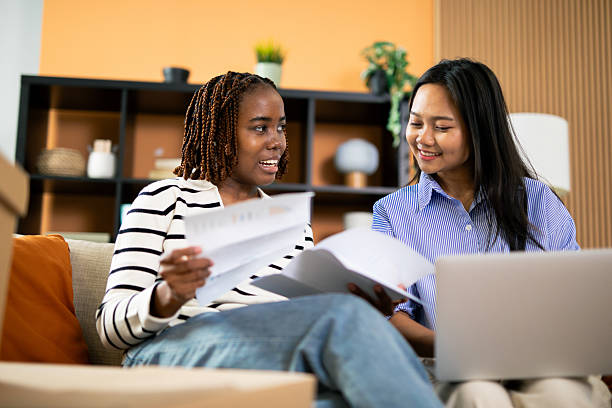 istock Diverse roommates managing monthly finances and bills together 2248559226