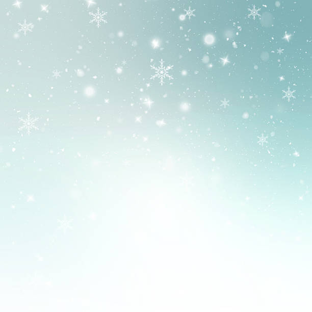 istock Christmas background featuring gentle snowfall, sparkling highlights, and a bright light blue to white radial gradient. Perfect for digital cards and winter promotions 2248560425
