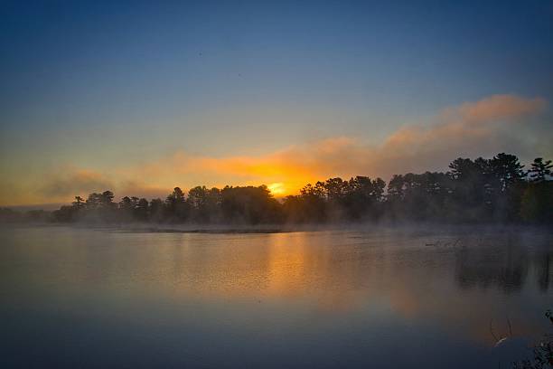 istock Early Morning Fog over Rustic Lake 2248563042