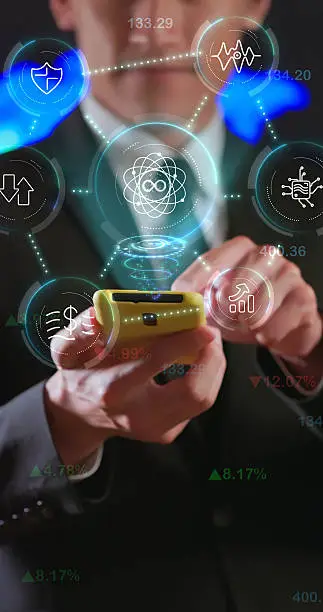 Photo of Businessman using smartphone with quantum technology interface