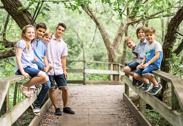 istock Fun time for family children in summer forest 2248565922