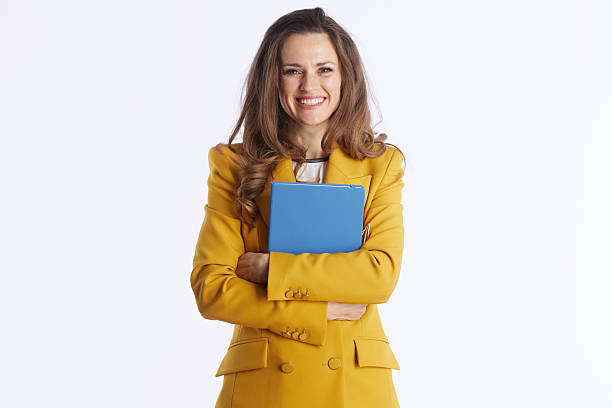 istock Confident Businesswoman with Blue Folder, Arms Crossed 2248567754