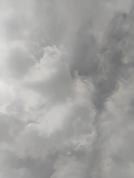 White and gray clouds in a blue sky, dramatic, changeable weather, dramatic sky
