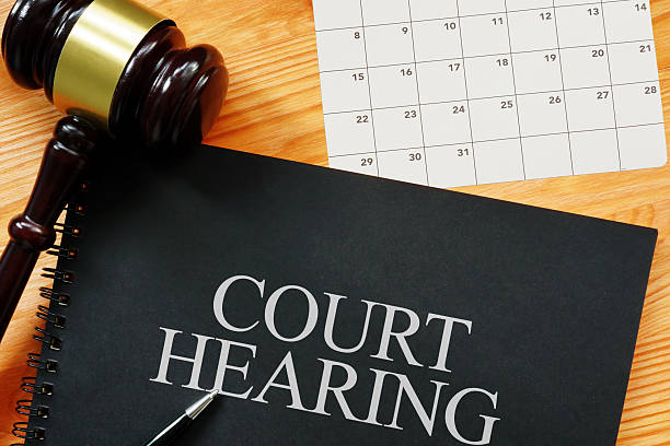 istock Court Hearing is shown using the text as legal concept 2248570870