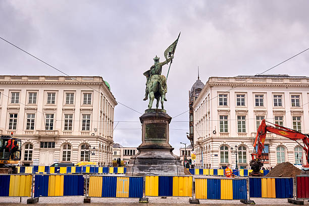 Brussels, Belgium, 20th of November, 2025. A rear view of the equestrian statue of Godfrey of Bouillon in Royal Square (Place Royale), Brussels, Belgium. The statue is surrounded by temporary barriers and construction work, creating a contrast between historic monument and urban renewal.