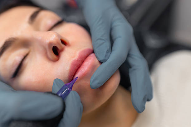 istock Close up of a cosmetologist performing permanent 2248572580