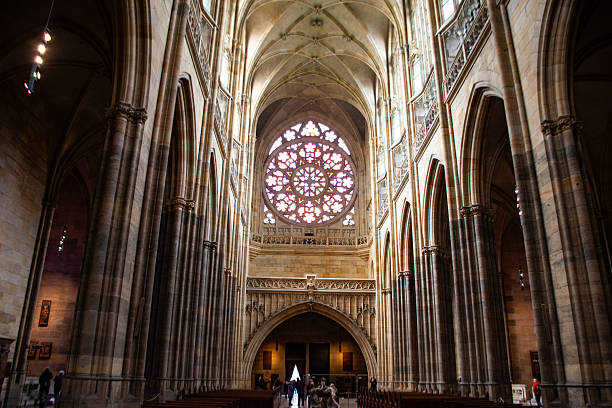 A beautiful interior view of St. Vitus Cathedral. It is a prominent example of Gothic architecture, and is the largest and most important church in the country. Located within Prague Castle and containing the tombs of many Bohemian kings and Holy Roman Emperors.