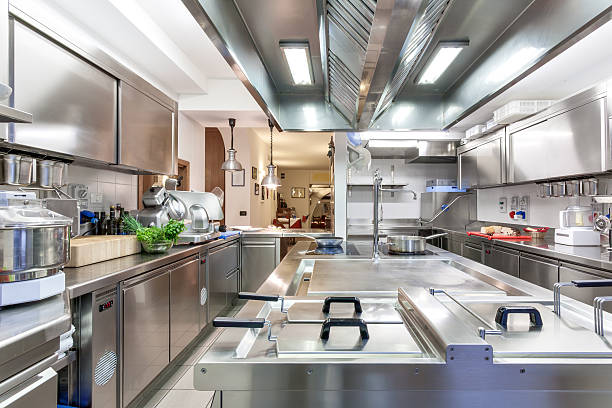 Asian kitchen interior with cooking different dishes. Selective focus