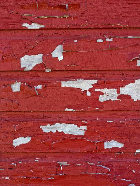Peeling paint on old red barn at Carter historic farm. Carter historic farm land and buildings part of the Wood County Park District and Black Swamp nature conservancy open to the public.