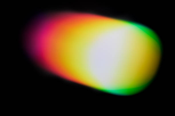 istock Abstract colorful light leak with soft gradient glow on a dark background. 2248580179