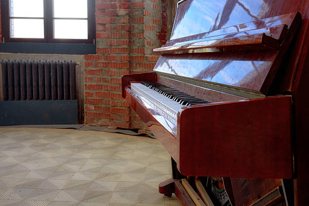 istock A piano with an open lid and keys in perspective. 2248581547