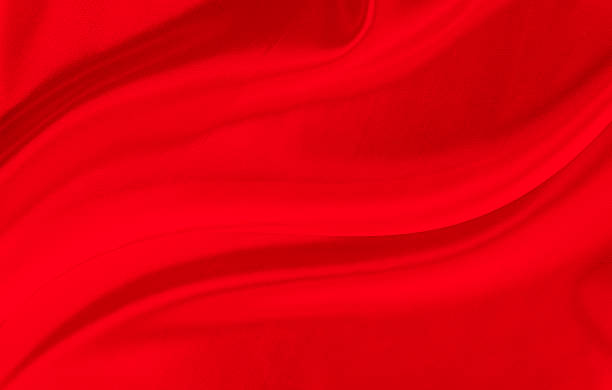 istock Black red satin dark fabric texture luxurious shiny that is abstract silk cloth background with patterns soft waves blur beautiful. 2248585007