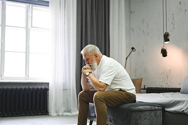 istock Senior man feeling lonely and depressed at home 2248589943