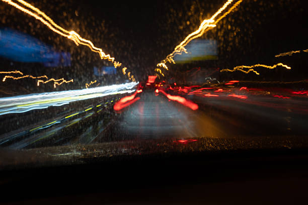 istock High-speed drive through abstract city lights 2248592289