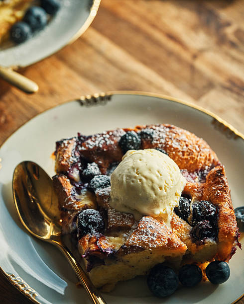 istock Fresh Baked Bread Pudding with Blueberries and Vanilla Ice Cream 2248595752