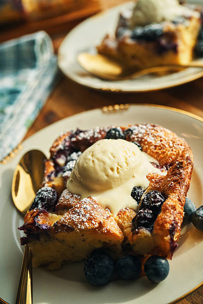 istock Fresh Baked Bread Pudding with Blueberries and Vanilla Ice Cream 2248595848