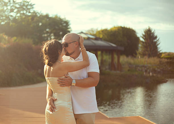 Beautiful young couple in backlight
