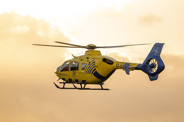 The North West Air Ambulance based at Barton Aerodrome staffed by NHS doctors, The  helicopter is in flight.