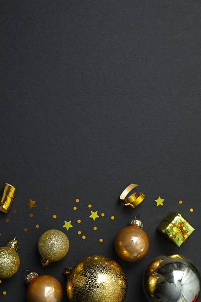 istock Black festive Christmas background with golden decoration, copy space composition 2248609220