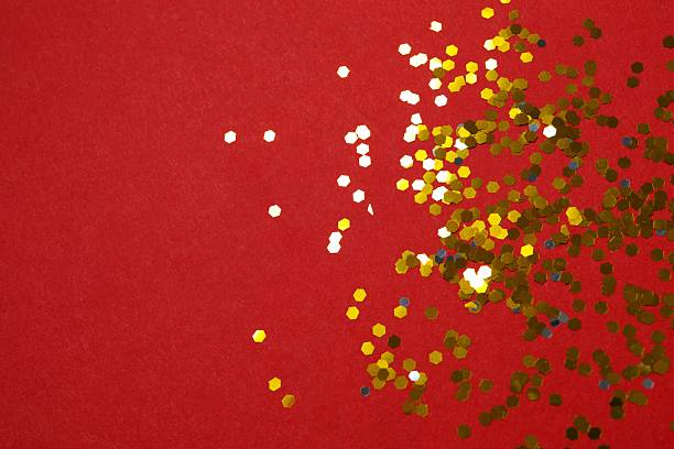 istock Golden confetti on color background, top view 2248609861