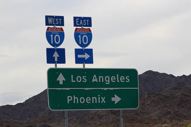 istock Interstate Road Sign I10 East West Los Angeles and Phoenix 2248611862