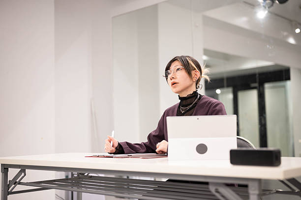 istock A female judge waits for audition candidates to arrive 2248614105