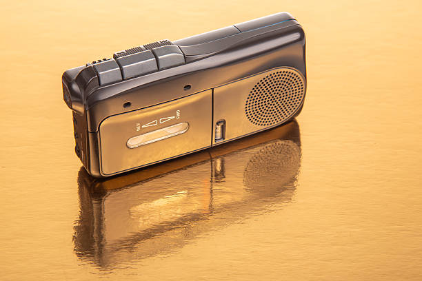 istock Vintage tape recorder on reflective surface showcasing sound technology from the past 2248615593