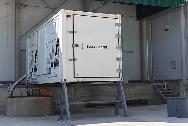 istock Portable industrial blast freezer unit sits outdoors at a warehouse facility, 2248615860