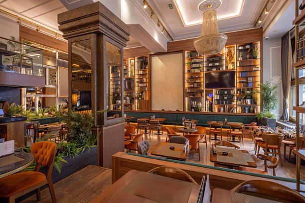 istock Restaurant interior featuring wooden furniture, soft lighting, and timeless design 2248619073