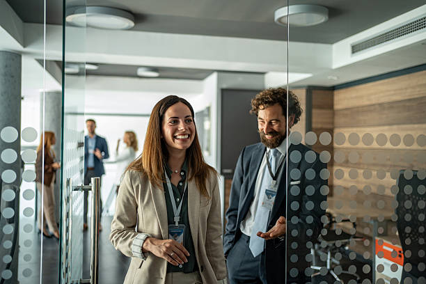 istock Business colleagues entering office feeling happy and positive 2248619994